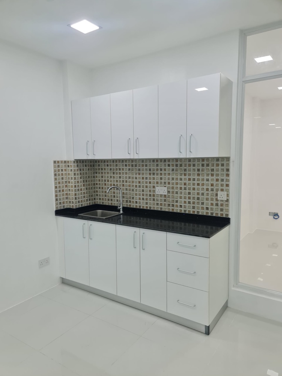 Office pantry with cabinetry