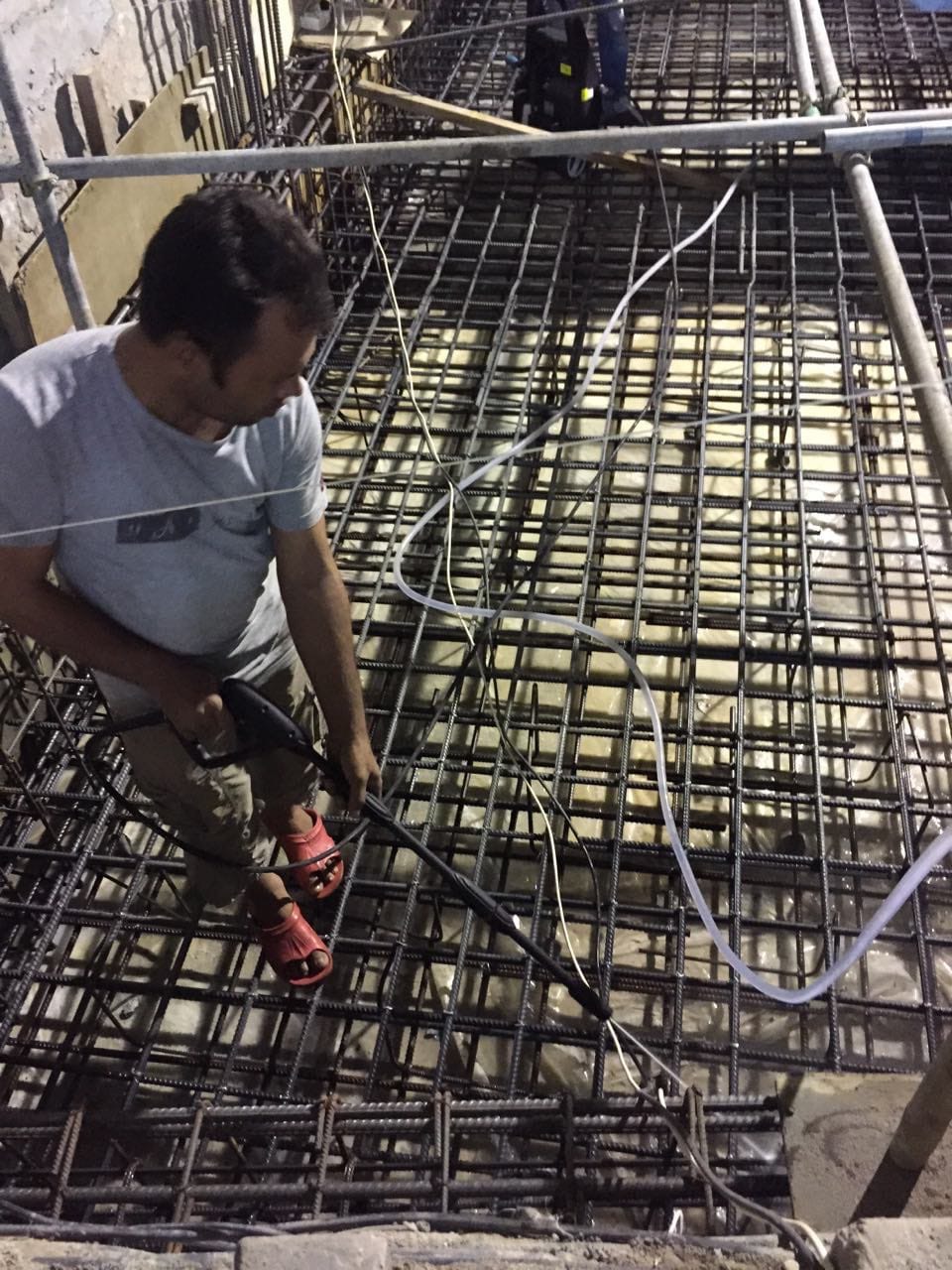Worker preparing rebar reinforcement