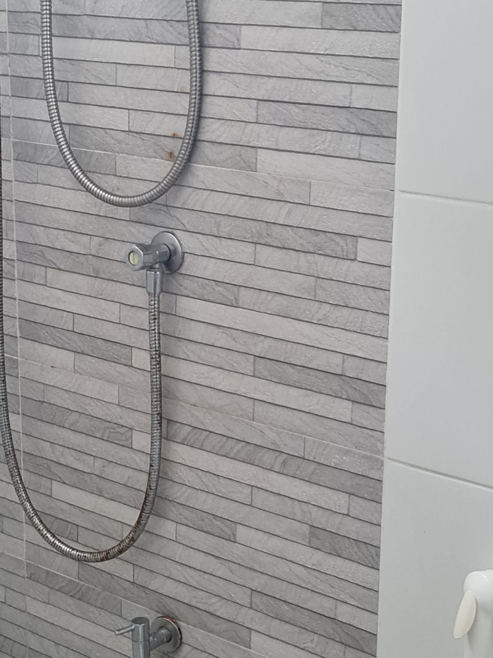 Washroom with stone tiling
